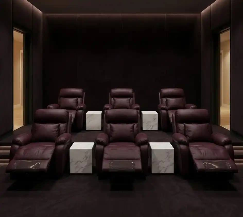 Luxury cinema room with deep red recliner seating
